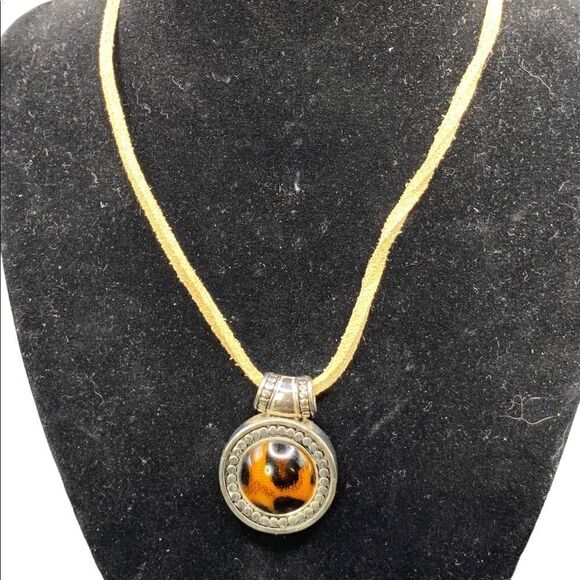 Leopard print silvertone pendant with beaded detail on tan sueded tied strap - Picture 1 of 8